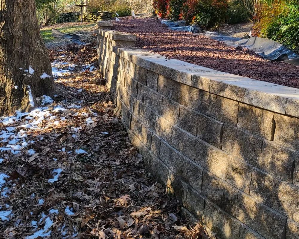 Professional traditional concrete block retaining wall installation in North Dakota